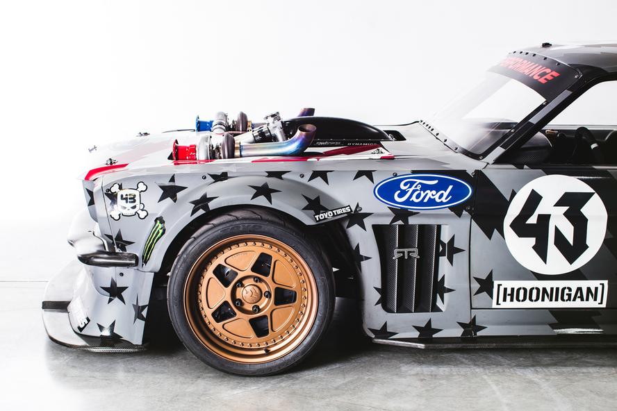 Just when you thought that one of the most iconic custom car builds of the last decade couldn’t get any better, Ken Block and Hoonigan have gone and improved upon the perfection that was Block’s 1965 Ford Mustang Hoonicorn RTR from Gymkhana SEVEN. How you ask? By adding two turbos to the equation and adding methanol.