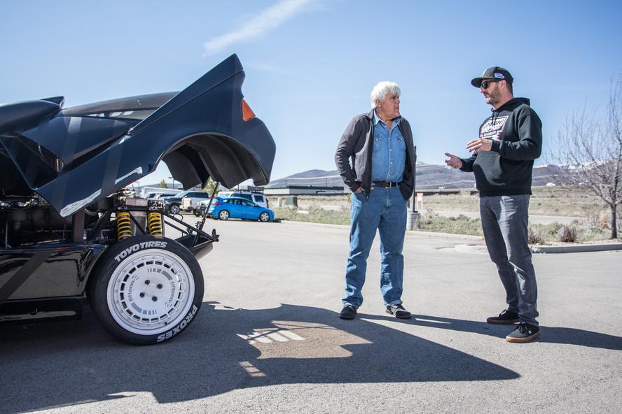 Recently, world-famous late-night host/car enthusiast, Jay Leno, swung by Ken Block’s Hoonigan Racing Division Headquarters in Park City, UT, to talk about one of Block’s favorite subjects: the Ford RS200 Group B car! The visit was a part of Leno’s Jay Leno’s Garage show on CNBC.