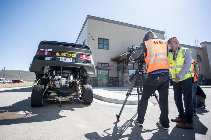 Recently, world-famous late-night host/car enthusiast, Jay Leno, swung by Ken Block’s Hoonigan Racing Division Headquarters in Park City, UT, to talk about one of Block’s favorite subjects: the Ford RS200 Group B car! The visit was a part of Leno’s Jay Leno’s Garage show on CNBC.