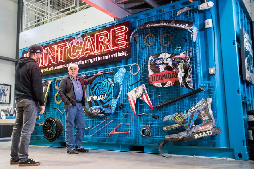 Recently, world-famous late-night host/car enthusiast, Jay Leno, swung by Ken Block’s Hoonigan Racing Division Headquarters in Park City, UT, to talk about one of Block’s favorite subjects: the Ford RS200 Group B car! The visit was a part of Leno’s Jay Leno’s Garage show on CNBC.